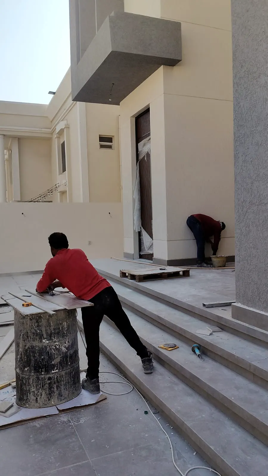 Mason cutting stone for external stair cladding