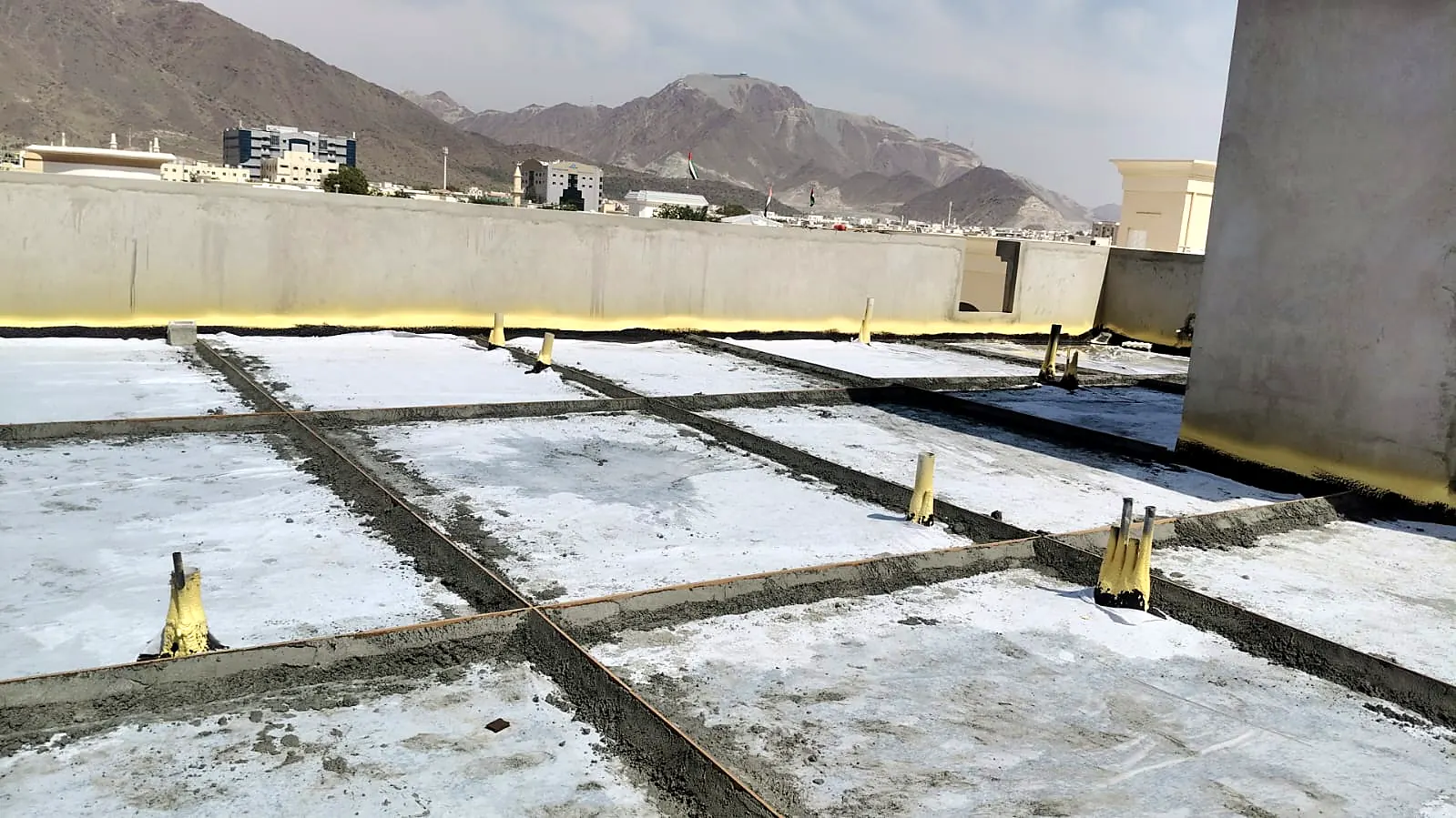 Roof slab with sealed joints during waterproofing preparation